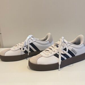 Adidas Woman’s White Sneakers with Black Stripes